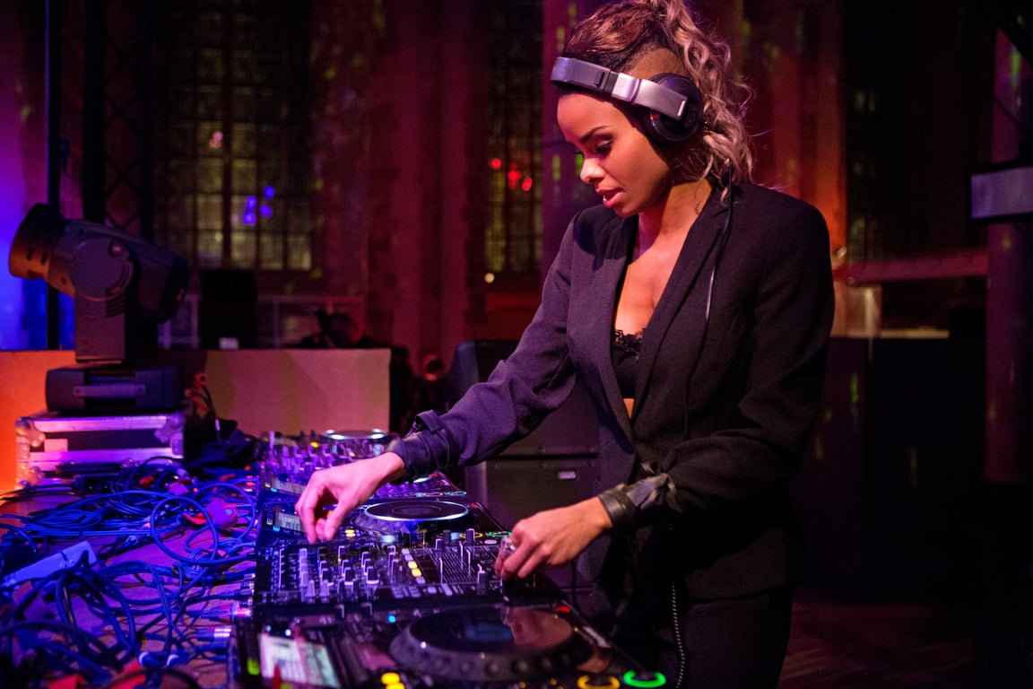 female DJ performing